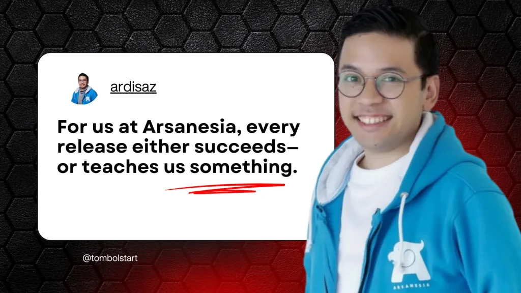 A smiling individual wearing a blue hoodie with a white t-shirt underneath is positioned against a textured black background. The text displayed reads: "For us at Arsanesia, every release either succeeds—or teaches us something." The individual's name is shown as "ardisaz."
