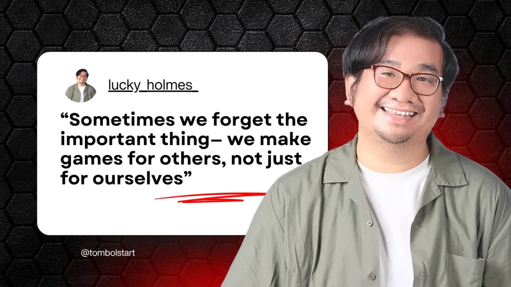 A smiling man with glasses and a green overshirt stands beside a quote card. The quote says, “Sometimes we forget the important thing— we make games for others, not just for ourselves,” attributed to "lucky_holmes." The background features a dark hexagonal pattern with red lighting accents. The image is tagged with the handle "@tombolstart."