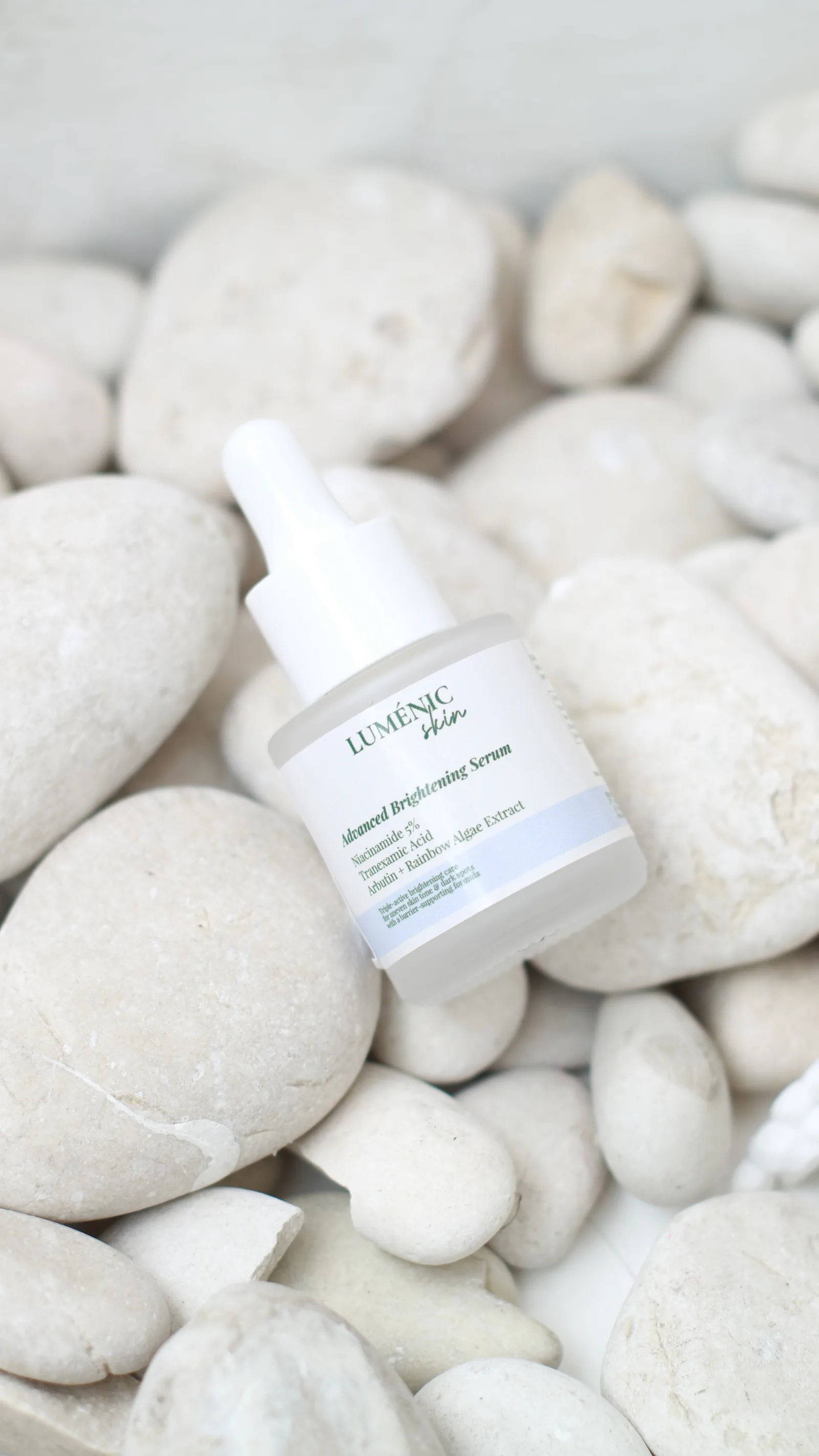 Lumenic Skin serum on natural stones