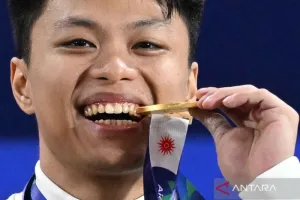 Rekor Dunia Pecah! Rahmat Sempurnakan Perjuangan Indonesia dengan Medali Emas di Asian Games 2026