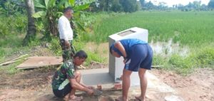 Satgas TMMD Buat Tugu Prasasti Pembangunan Infrastruktur di Kampung Jawi