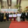 BPJS Ketenagakerjaan Serahkan Klaim Simbolis dalam Peringatan HUT ke-22 Kabupaten Banyuasin